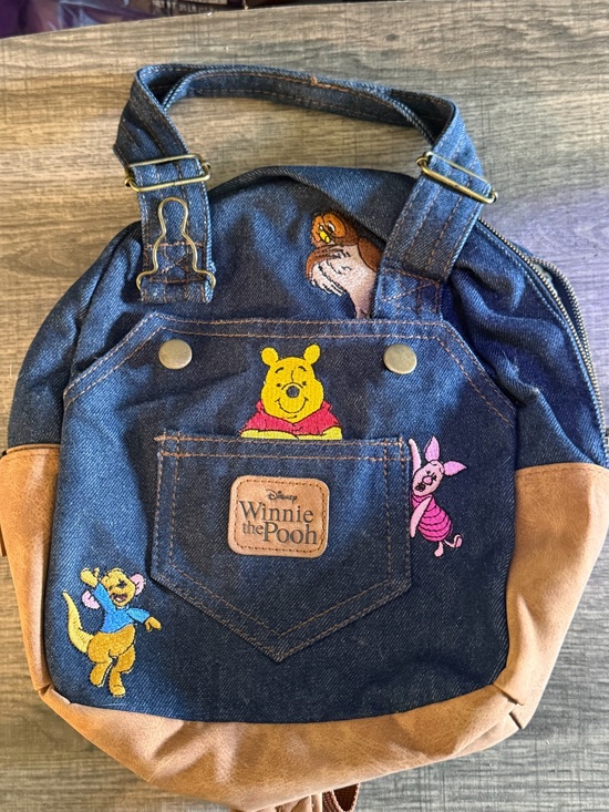 Disney Handbags - Her Universe Disney Winnie the Pooh Denim Overall Mini Backpack NWT